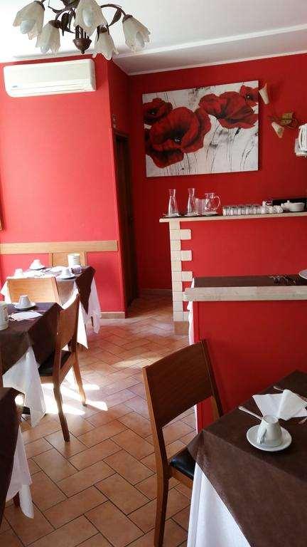 Hotel Properzio Ассизи Ресторан фото